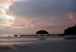 Sunset in Phuket taken with an Olympus Camedia. by Marilyn Hiatt 